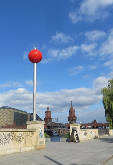 The 'Signalkugel' sculpture on the May-Ayim-Ufer, Berlin, which rises and falls as river traffic passes on the Spree.