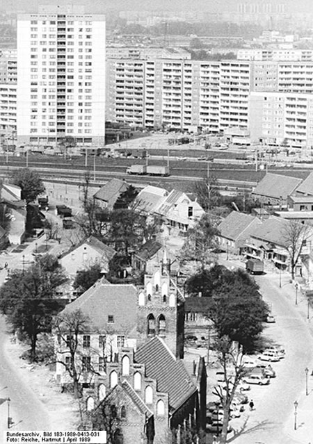 Historic photograph of Marzahn showing the development of the GDR tower blocks around the ancient village