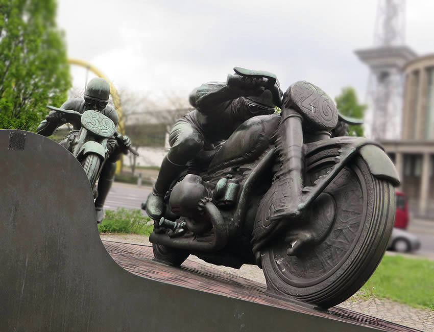 A bronze monument located on Berlin's  Messedamm / Halenseestraße commemorates the intrepid speed racing cyclists of the AVUS circuit