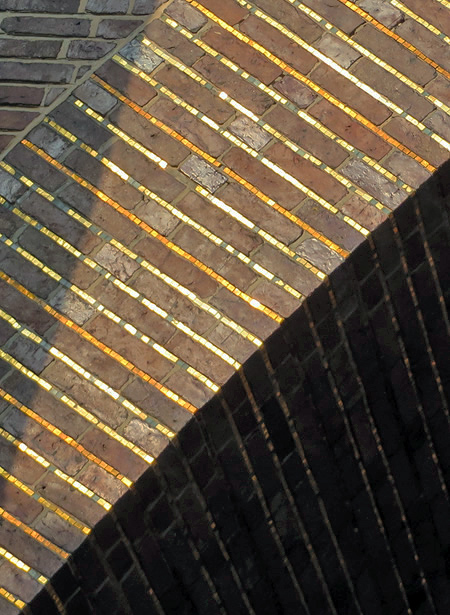 Brickwork defined by lines of gold tiling, Church at Hohenzollerndammplatz, Berlin