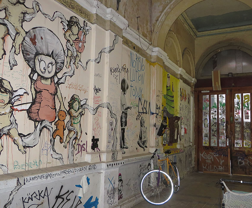 Art and grafitti covered entrance hall, Berlin
