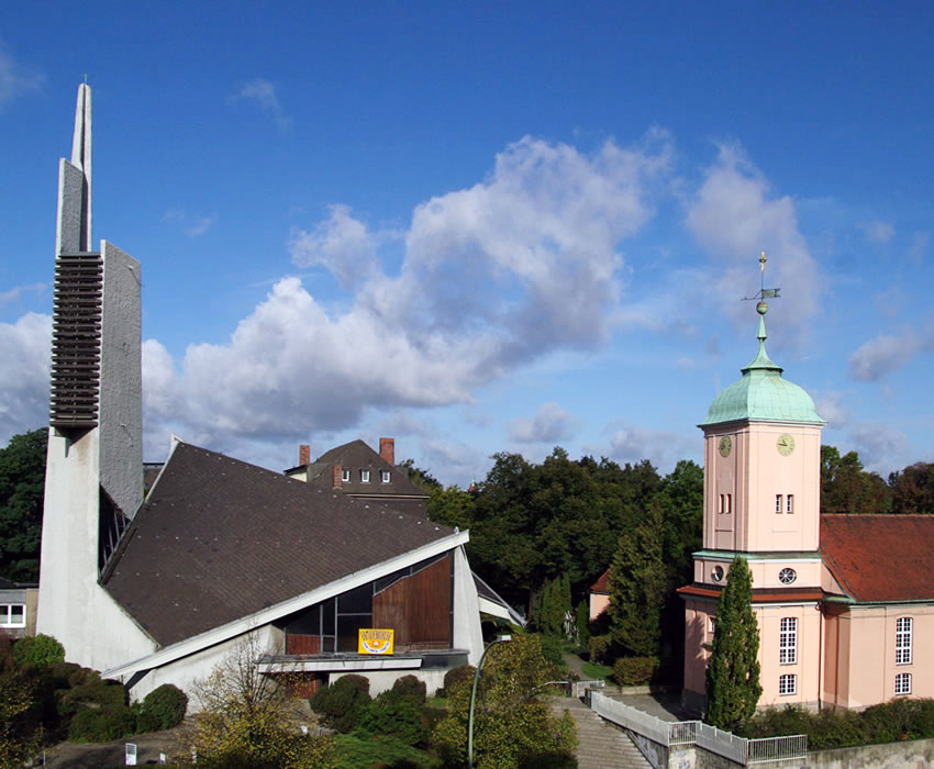 Schöneberg Dorfkirche is located next to a post-war modernist classic, Paul-Gerhardt-Kirche, Berlin